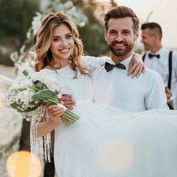 Smiling wedding couple enjoying their special day.