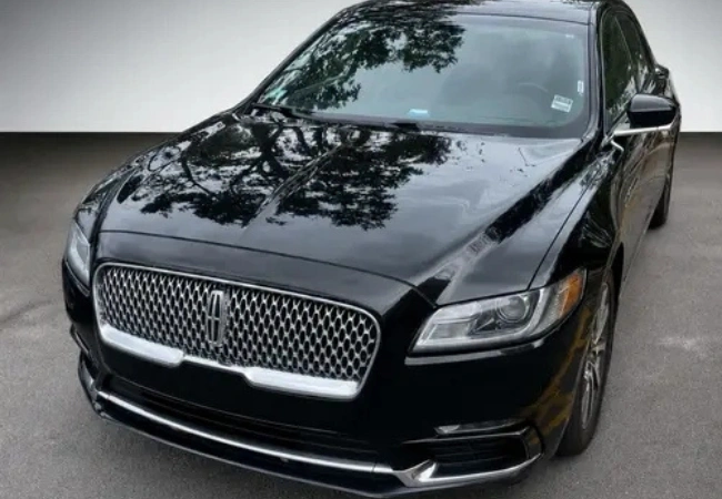 Luxury black sedan for Logan Airport car service Luxury black sedan for Logan Airport car service