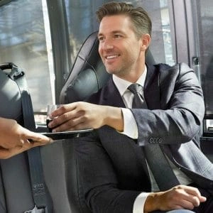 Passenger enjoying a private charter bus ride